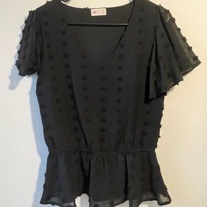 Black blouse with poms